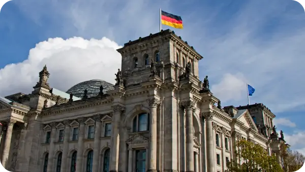 Reichstag building in Berlin with the German flag